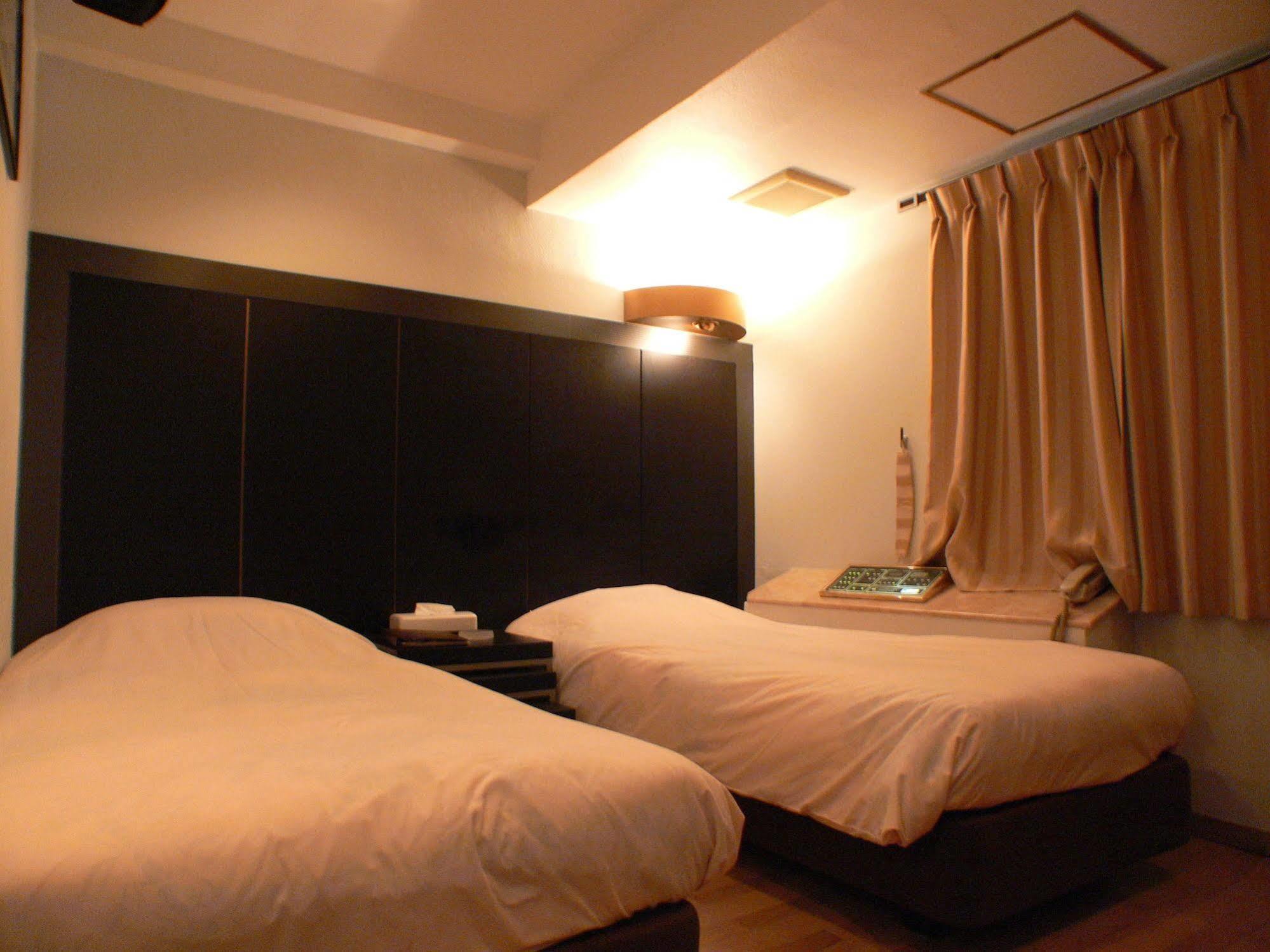 Shinjuku City Hotel N.U.T.S Токио Номер фото